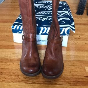 Brown leather boot with buckle